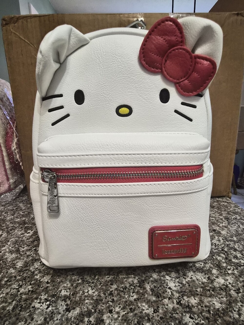 Loungefly White Hello Kitty Mini Backpack with Pink Bow